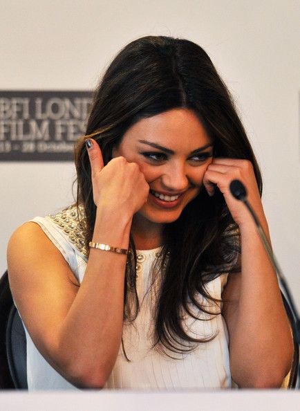 mila kunis love bracelete