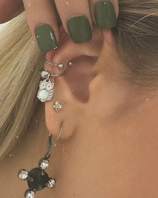 conch piercing coruja