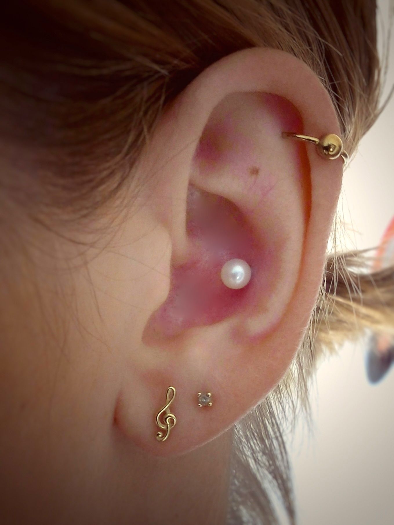 conch piercing perolas