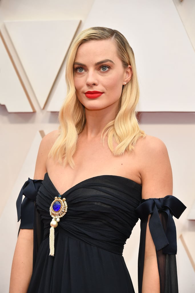 Broche de Margot Robbie no Oscar 2020